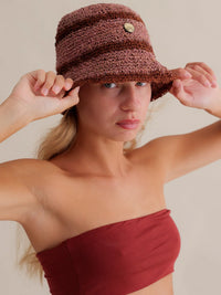 Crochet Hat - Rosa — Striped brown raffia hat on model — MYFASHIONFRUIT