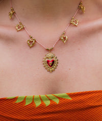 Rousseau Necklace — Gold heart pendant on pink cord on model — MYFASHIONFRUIT
