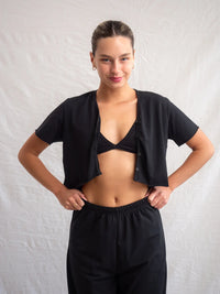 Woman wearing a black Yin Cardi with three buttons, and matching pants — MYFASHIONFRUIT