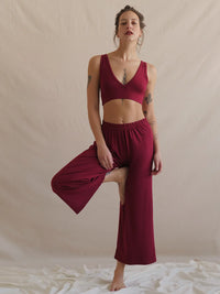 Woman wearing Tender Pants — burgundy wide-leg soft-touch pants and matching crop top — MYFASHIONFRUIT