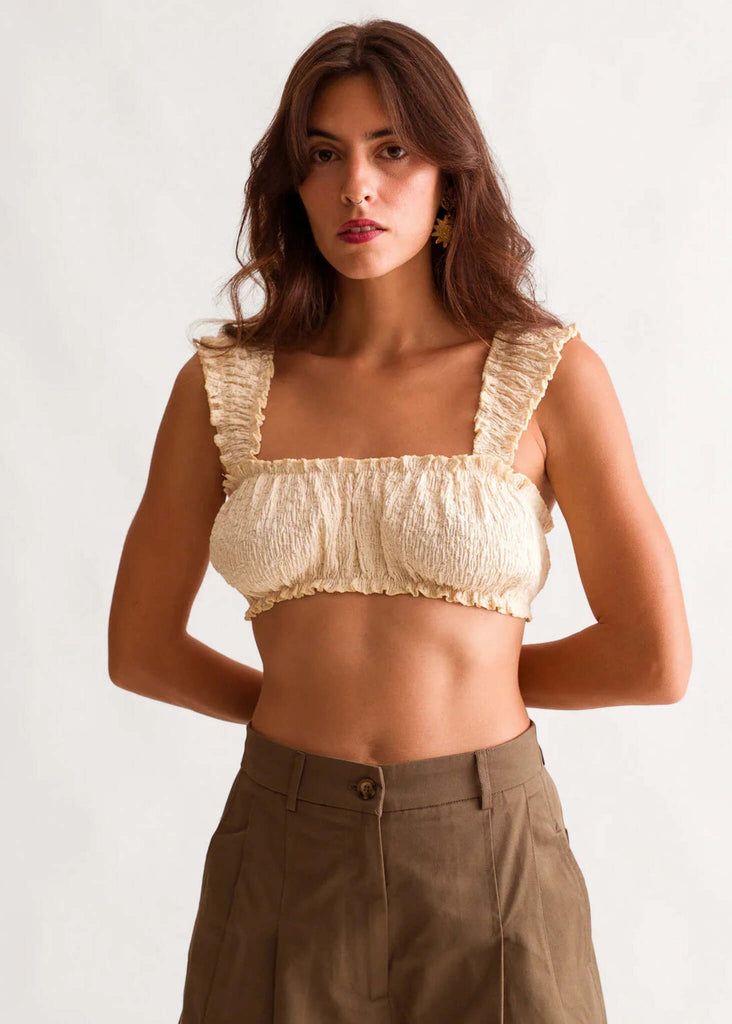 Cielo Top — Model wearing cream-colored smocked crop top — MYFASHIONFRUIT