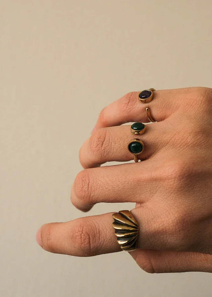 Canis Minor Ring — Gold rings with stones on hand, detail — MYFASHIONFRUIT