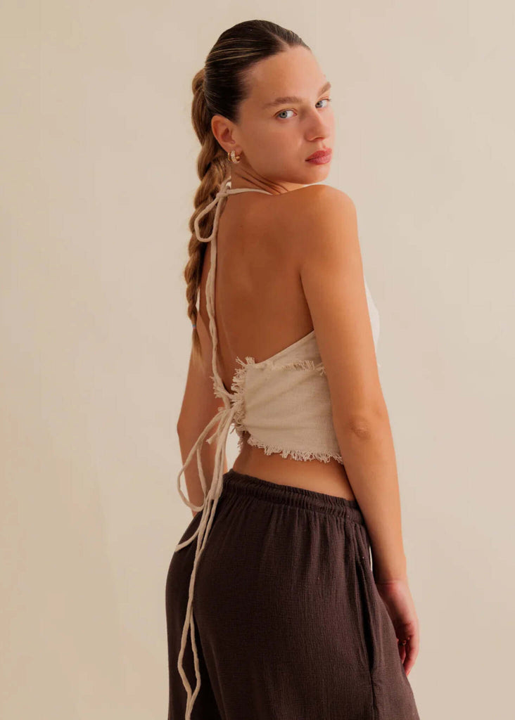 Amaya Top — Cream halter top with brown pants on model — MYFASHIONFRUIT