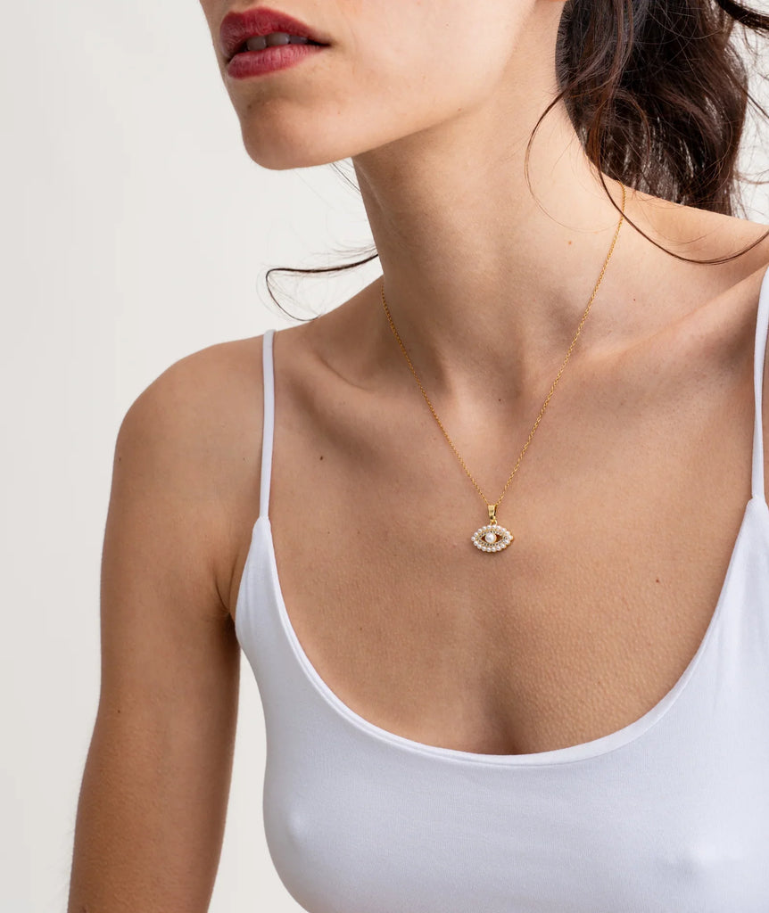 Lora Necklace — Gold evil eye pendant on model — MYFASHIONFRUIT