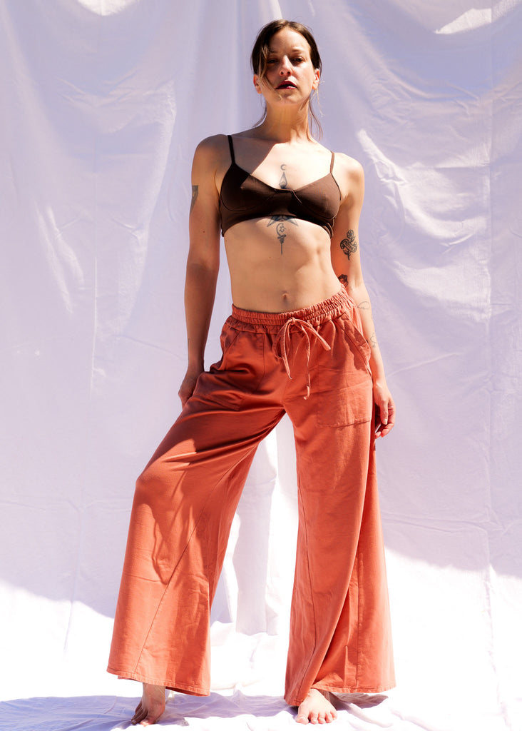 Serenity Wide Sweatpants — Orange wide leg pants on model — MYFASHIONFRUIT