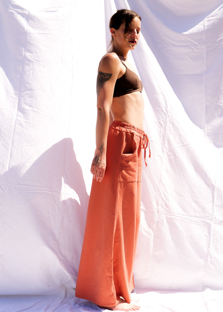 Serenity Wide Sweatpants — Orange wide leg sweatpants on a model — MYFASHIONFRUIT