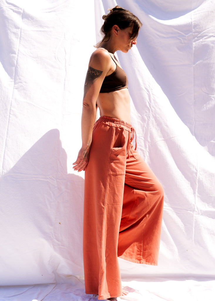 Serenity Wide Sweatpants — Terracotta pants on model — MYFASHIONFRUIT