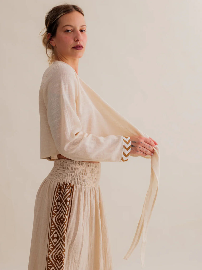 Zoe Wrap Top — Cream wrap top and skirt on model — MYFASHIONFRUIT