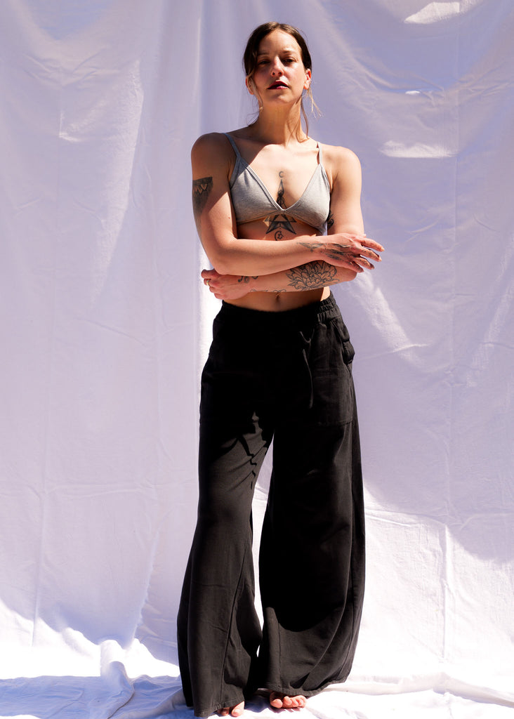 Serenity Wide Sweatpants — Black wide-leg pants on model — MYFASHIONFRUIT