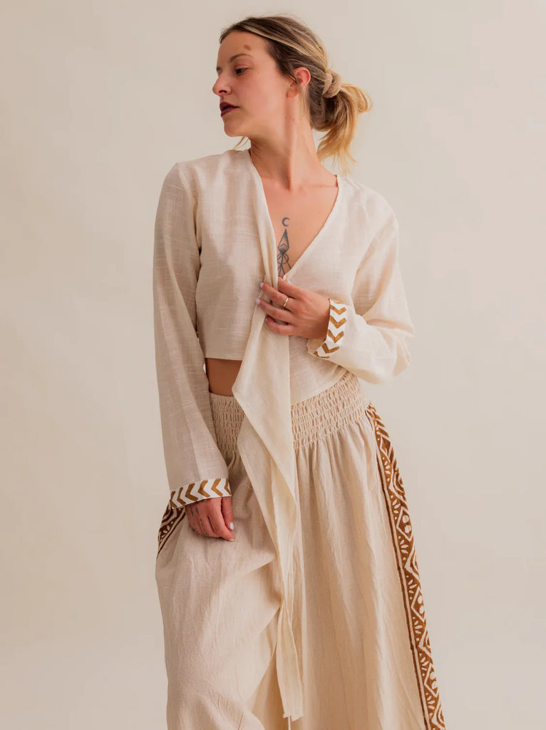 Zoe Wrap Top — Beige wrap top, long sleeves, geometric detail — MYFASHIONFRUIT