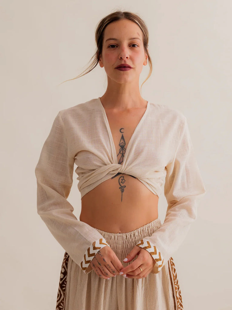 Zoe Wrap Top — Cream-colored linen crop top on a model — MYFASHIONFRUIT