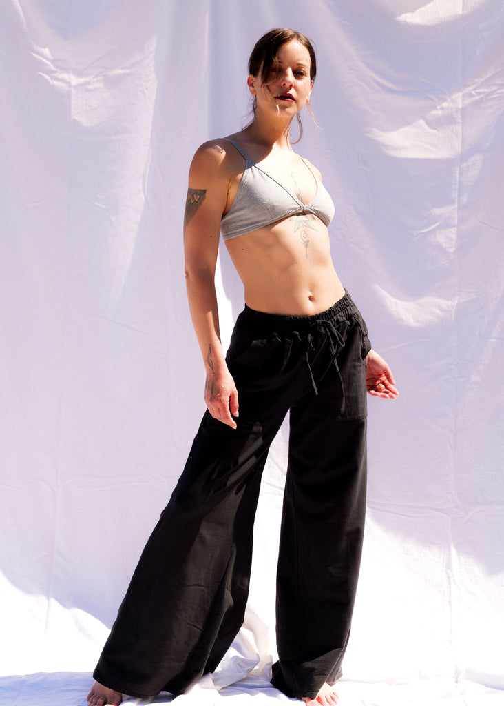 Serenity Wide Sweatpants — Black wide-leg pants on model — MYFASHIONFRUIT