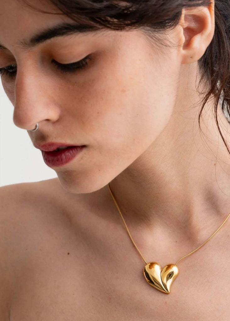 Lovey Necklace — Gold heart pendant on model — MYFASHIONFRUIT