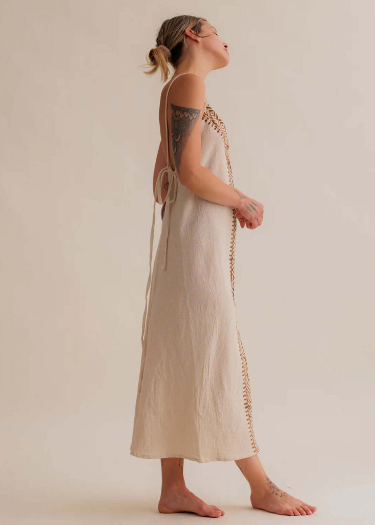 Violet Dress — Beige linen dress with brown embroidery detail on model — MYFASHIONFRUIT