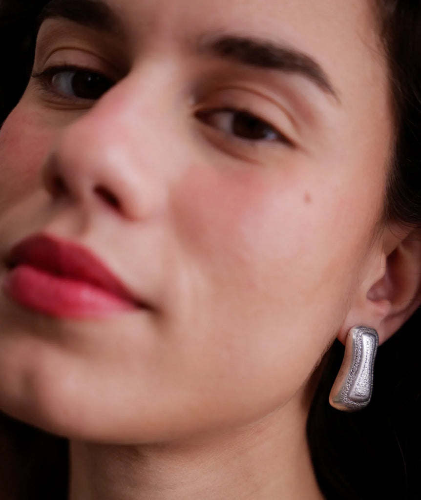 Minerva Earrings — Silver textured earring on model — MYFASHIONFRUIT