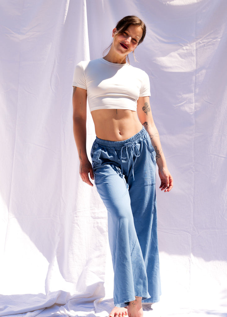 Serenity Wide Sweatpants — Blue sweatpants and white crop top on model — MYFASHIONFRUIT