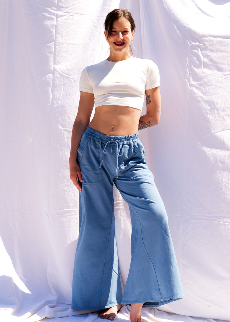 Serenity Wide Sweatpants — Blue sweatpants and white crop top on model — MYFASHIONFRUIT