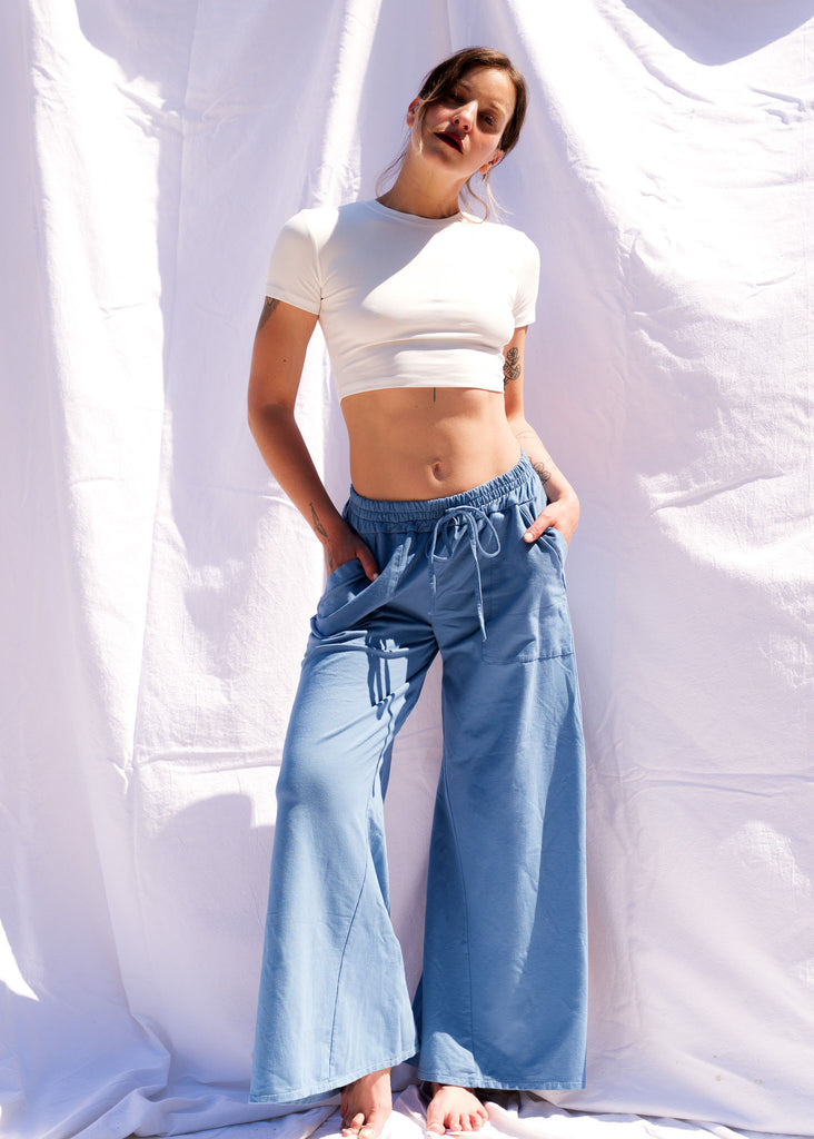 Serenity Wide Sweatpants — Blue sweatpants and white crop top on model — MYFASHIONFRUIT