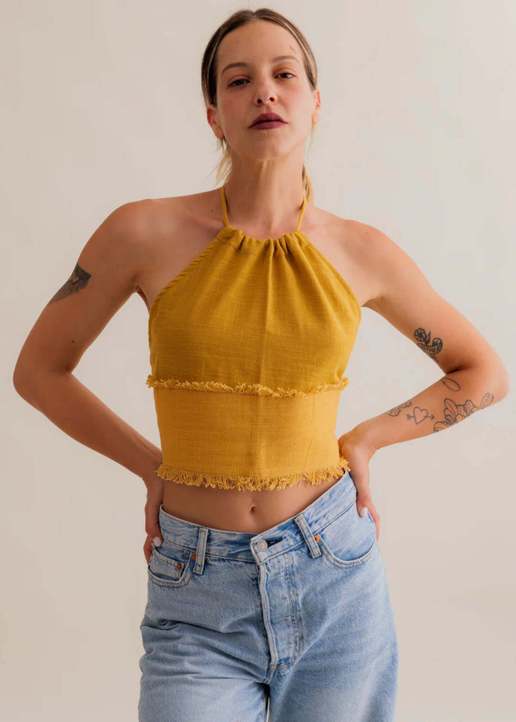 Amaya Top — Mustard yellow halter top with fringe details, on model — MYFASHIONFRUIT