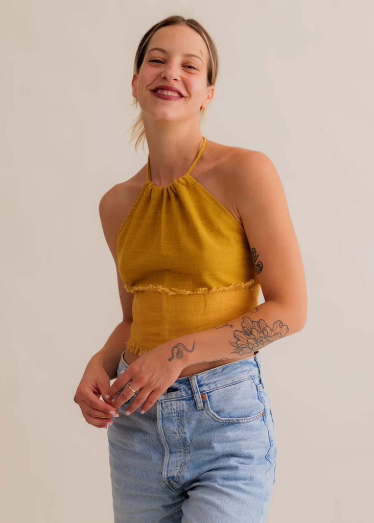 Amaya Top — Mustard yellow halter top with frayed edge on model — MYFASHIONFRUIT