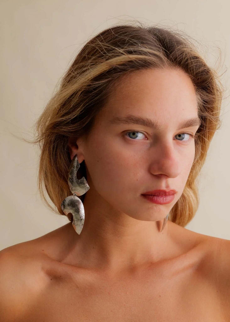 Riri Earrings — Silver textured earrings on model — MYFASHIONFRUIT