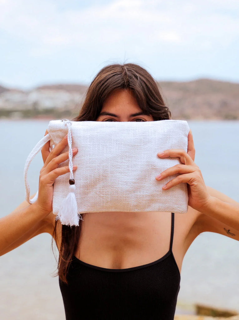 Bay Pouch — White linen tassel pouch on model — MYFASHIONFRUIT