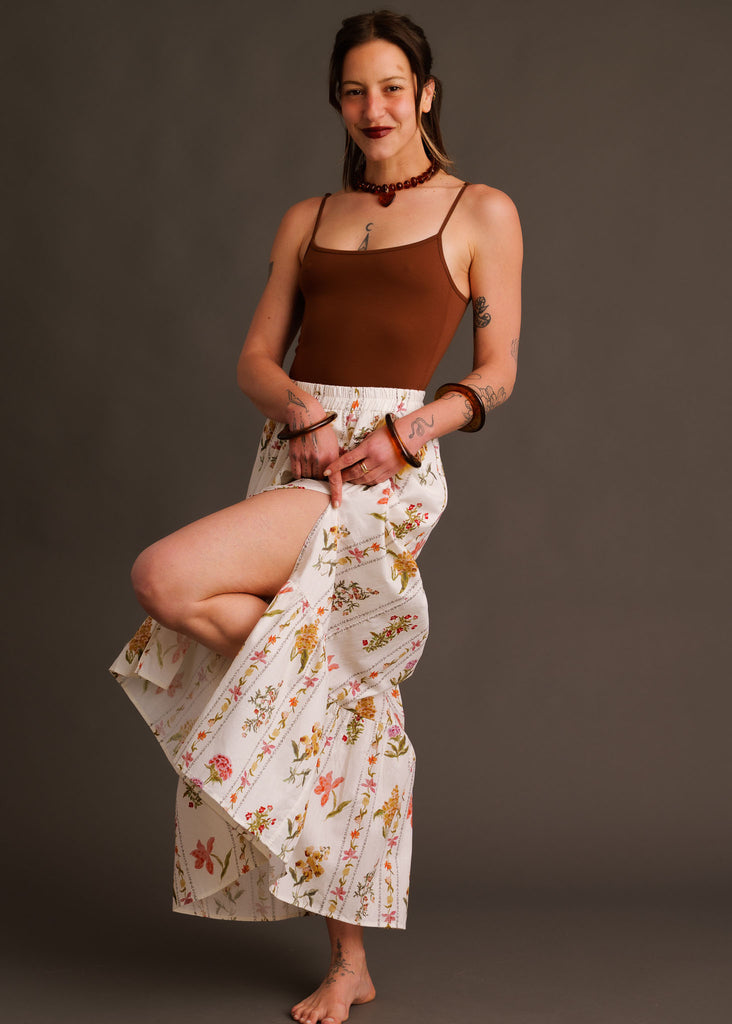 Castille Skirt — Floral print midi skirt with side slit on model — MYFASHIONFRUIT