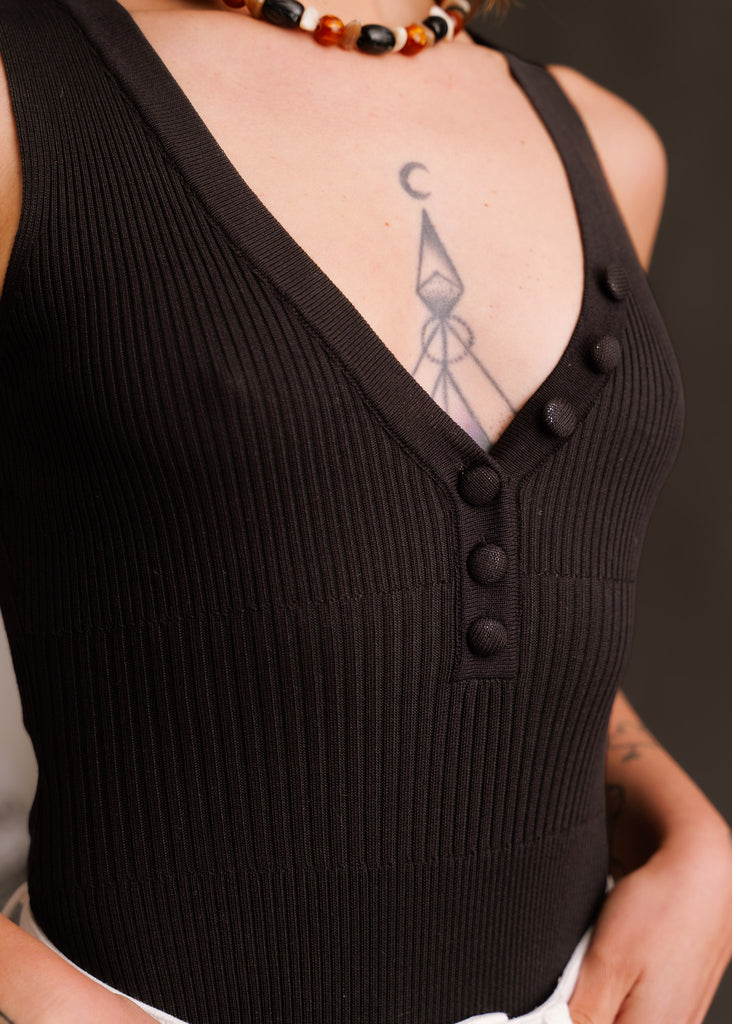 Noire Bodysuit — Black ribbed bodysuit detail on model — MYFASHIONFRUIT