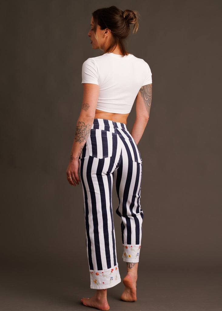 Mistral Pants — Navy stripe pants with floral cuffs on model — MYFASHIONFRUIT
