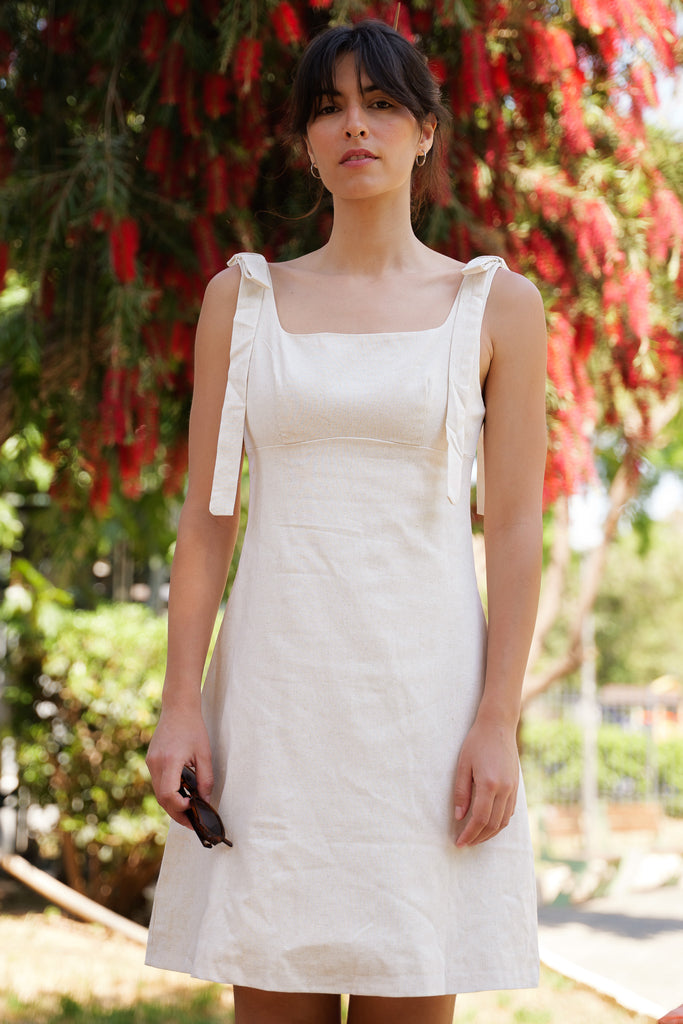 Sienne Dress — Beige linen dress with tie straps, on model — MYFASHIONFRUIT