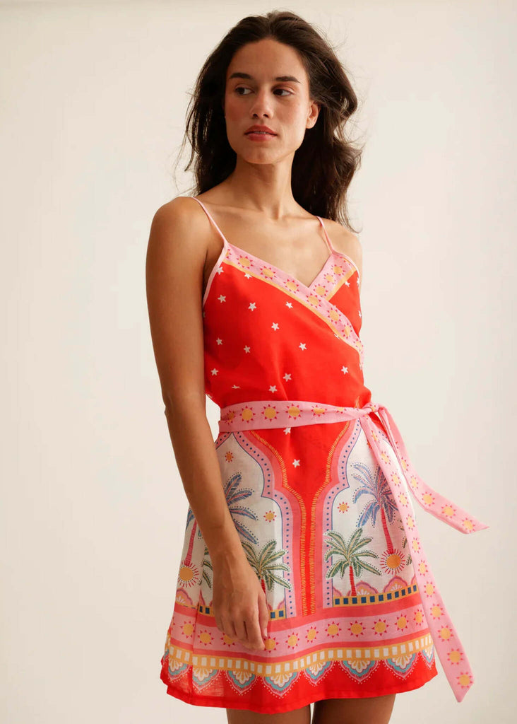 Delfina Dress — Red, pink, and white dress with palm trees on model — MYFASHIONFRUIT