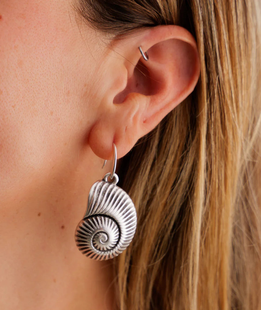 Pupu Earrings — Silver seashell earring on model, detail — MYFASHIONFRUIT
