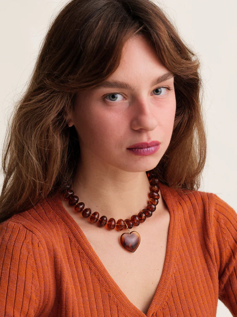Moyo Necklace — brown beaded necklace with heart pendant on model — MYFASHIONFRUIT