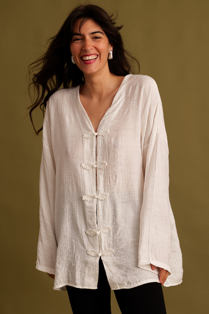 Soline Top — White tunic with leaf buttons on model — MYFASHIONFRUIT