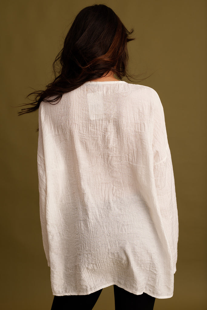 Soline Top — White textured top on model, back view — MYFASHIONFRUIT
