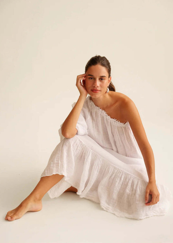 Yasmina Dress — White one-shoulder linen dress on model — MYFASHIONFRUIT