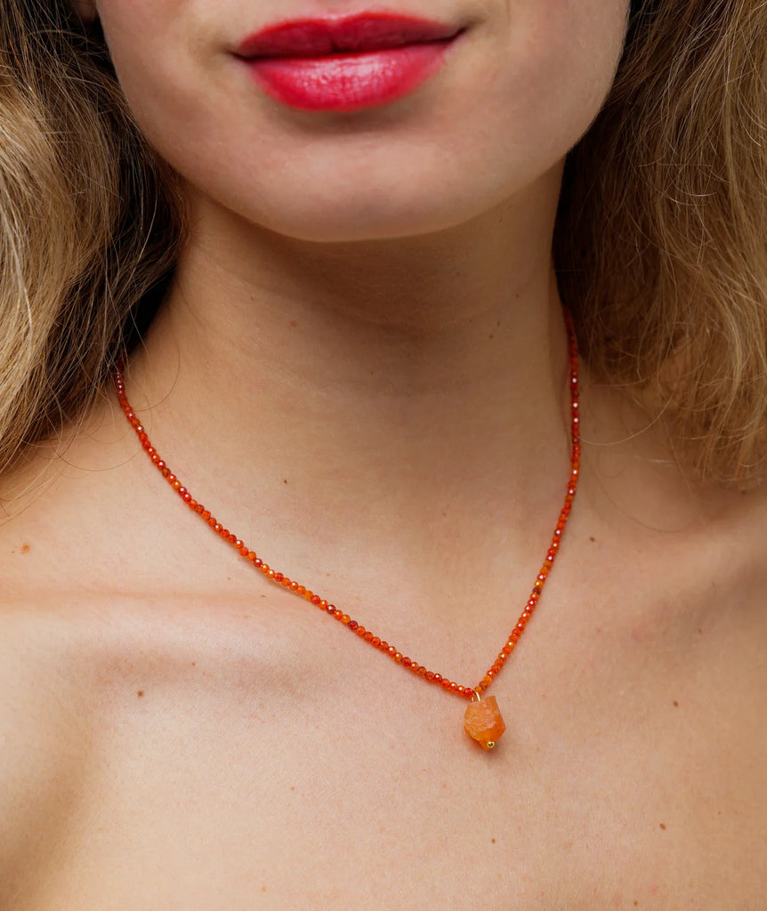 Calinda Pendant — Orange crystal necklace on model — MYFASHIONFRUIT
