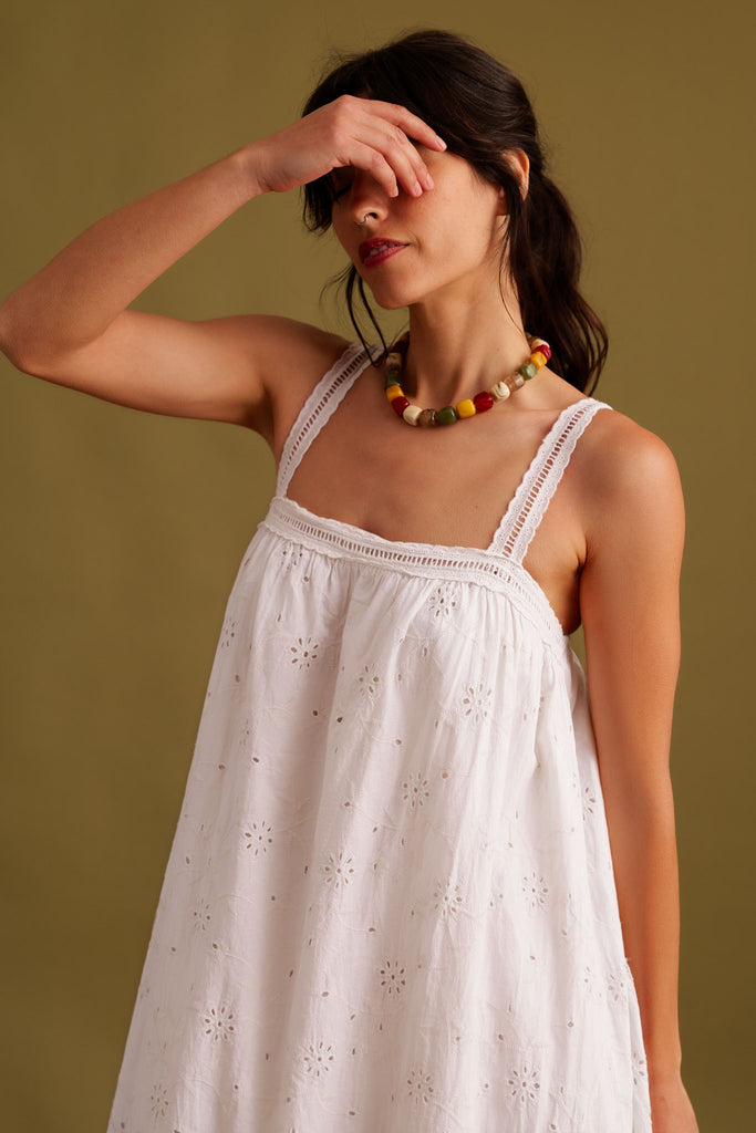 Nazara Dress — Model wearing white embroidered dress — MYFASHIONFRUIT