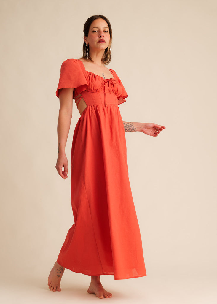 Alora Dress — Red linen dress, cut-out sides, on model — MYFASHIONFRUIT
