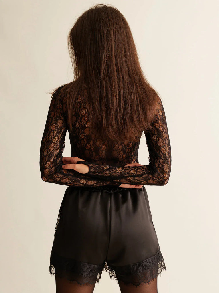 Marcia Shorts — Black shorts with lace trim on model — MYFASHIONFRUIT