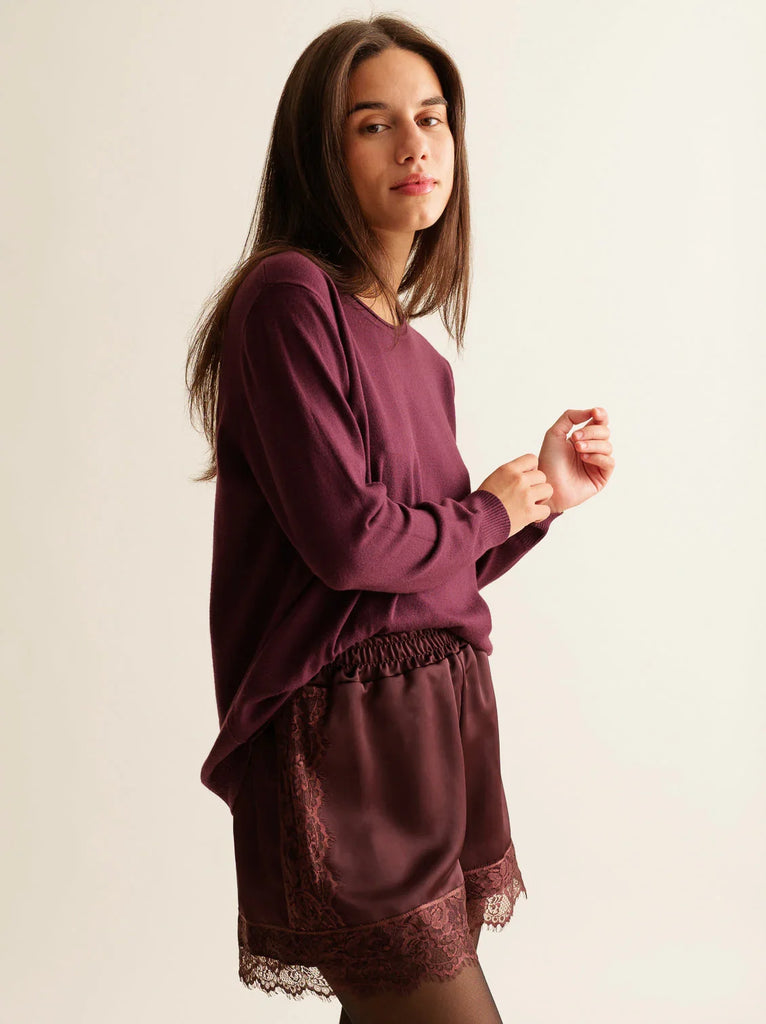 Marcia Shorts — Burgundy satin shorts with lace, on model — MYFASHIONFRUIT