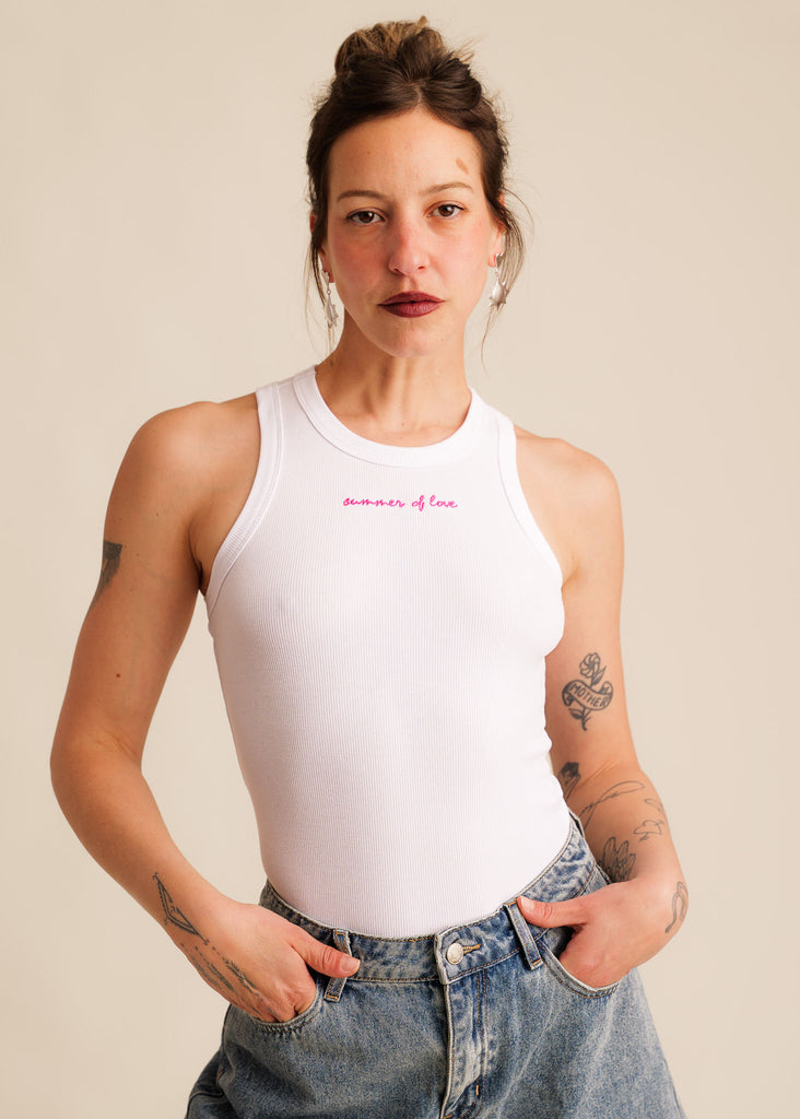 Reem Tank Top — White ribbed tank top with pink text on model — MYFASHIONFRUIT