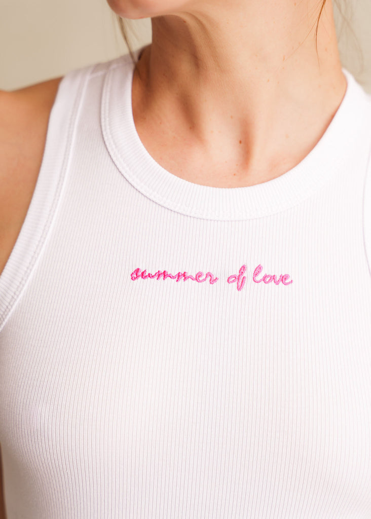 Reem Tank Top — Ribbed white tank top with pink embroidery on model — MYFASHIONFRUIT