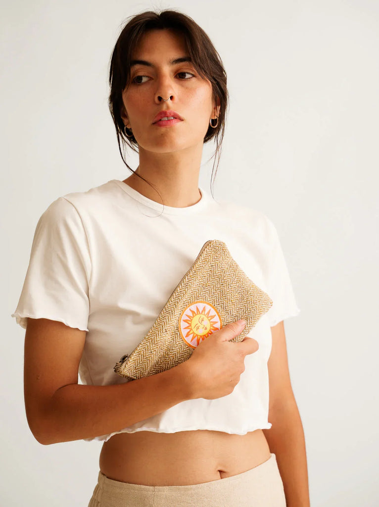 Sun Necessaire — Woven pouch with sun patch, on model — MYFASHIONFRUIT