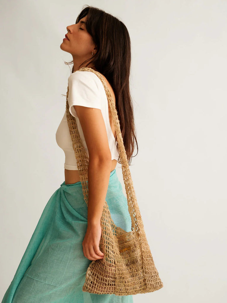 Uttara Shoulder Bag — On model, woven beige bag — MYFASHIONFRUIT