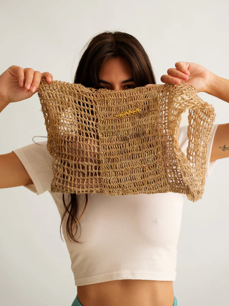 Uttara Shoulder Bag — Tan woven bag on model — MYFASHIONFRUIT