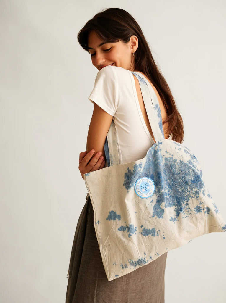 Moon Tote — Canvas bag with blue dye pattern, on model — MYFASHIONFRUIT