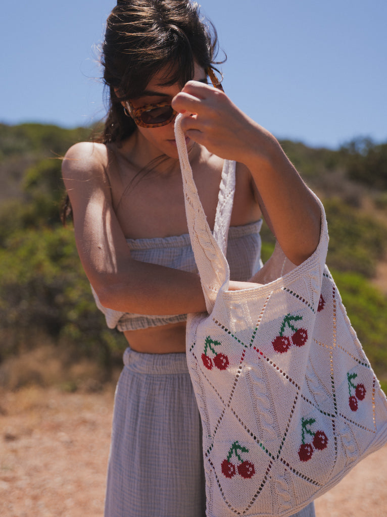 Cerise Crochet Bag — Crochet cherry bag on model — MYFASHIONFRUIT