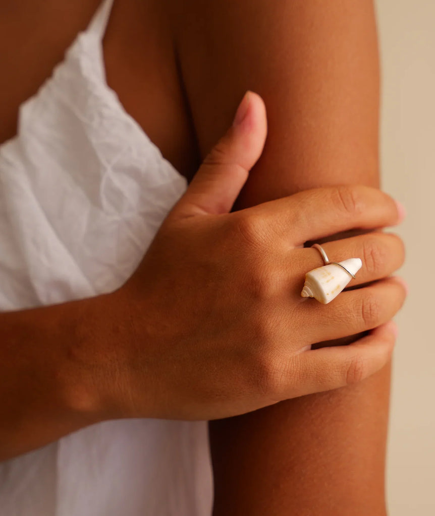 Naiad Ring — Silver ring with a small white seashell detail on model — MYFASHIONFRUIT