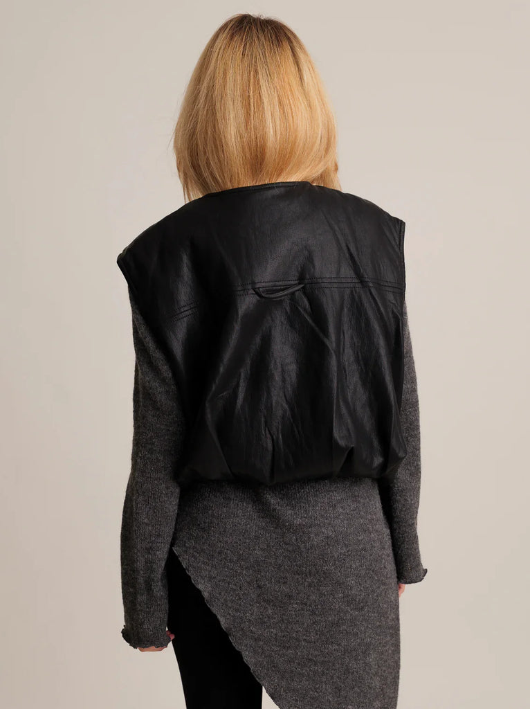 Kim Rider Vest — Black faux leather vest on model — MYFASHIONFRUIT